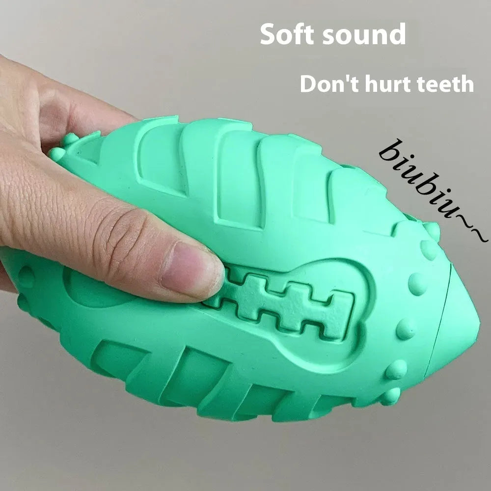 Light green and sapphire blue thickened rubber rugby ball dog toy with bite-resistant construction.