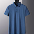 Man wearing a solid colour non-ironing short sleeve casual top in a navy blue shade.