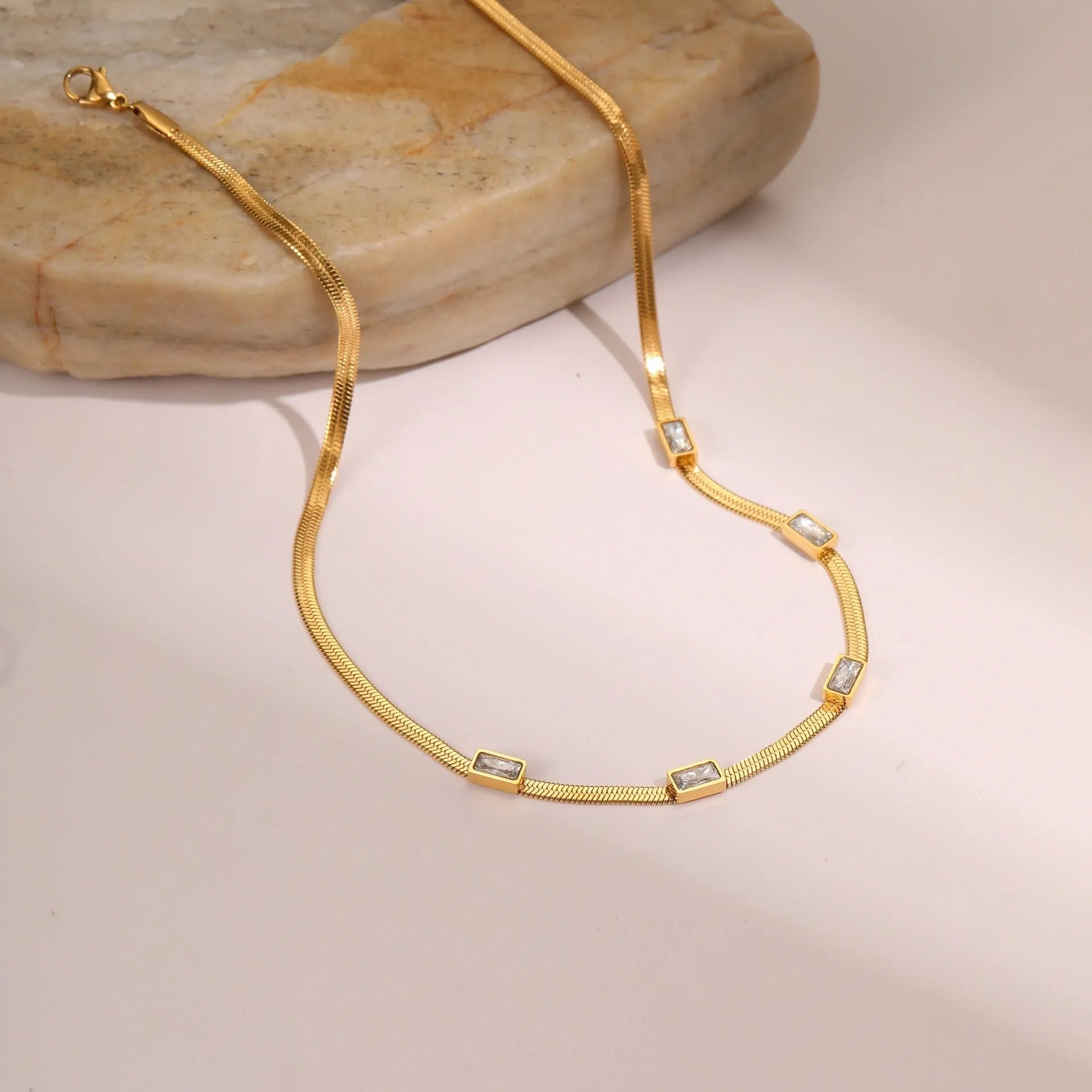 Geometric square zircon pendant necklace with stainless steel flat snake chain in gold or steel colour finishes