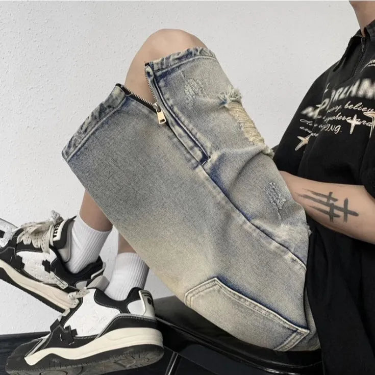 Blue retro denim shorts with a wide-leg loose fit and tattered distressing on the legs.