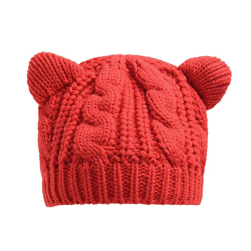 Hand knitted wool cat ear beanie in red colour for winter wear