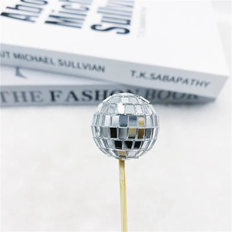 Glass disco ball cake decoration on wooden stick available in four sizes from 2.5cm to 5cm diameter