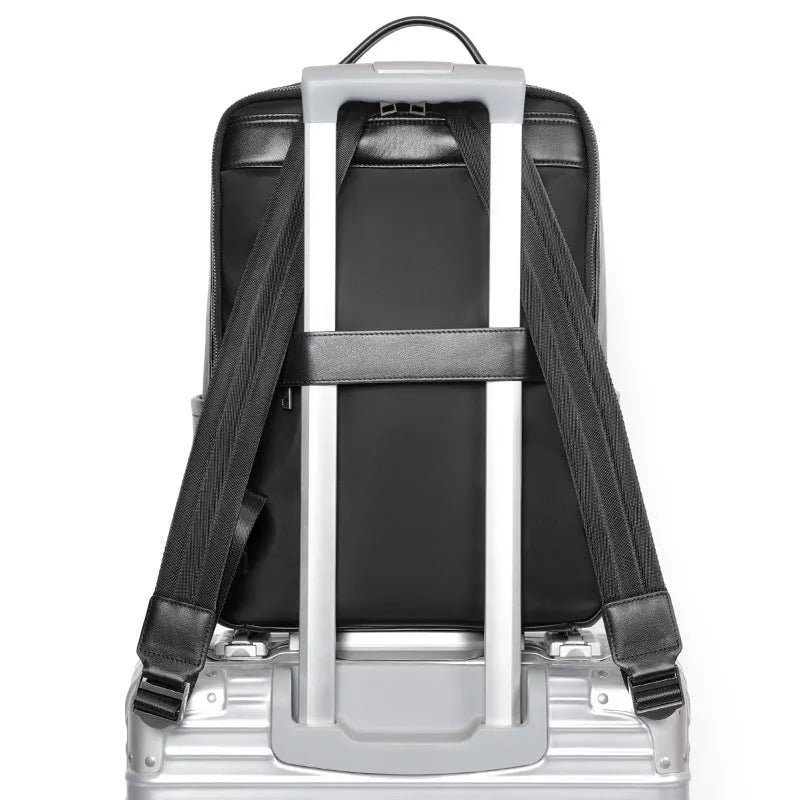 Black genuine leather men's computer backpack with woven details, shown open