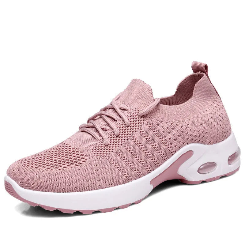 Women's black mesh sneakers with soft sole and round toe on a white background
