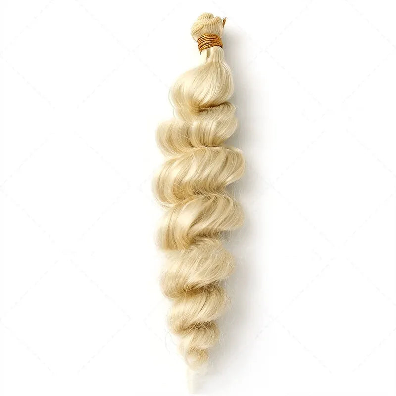 Golden long synthetic wig for women on a stand, showing hair weft construction