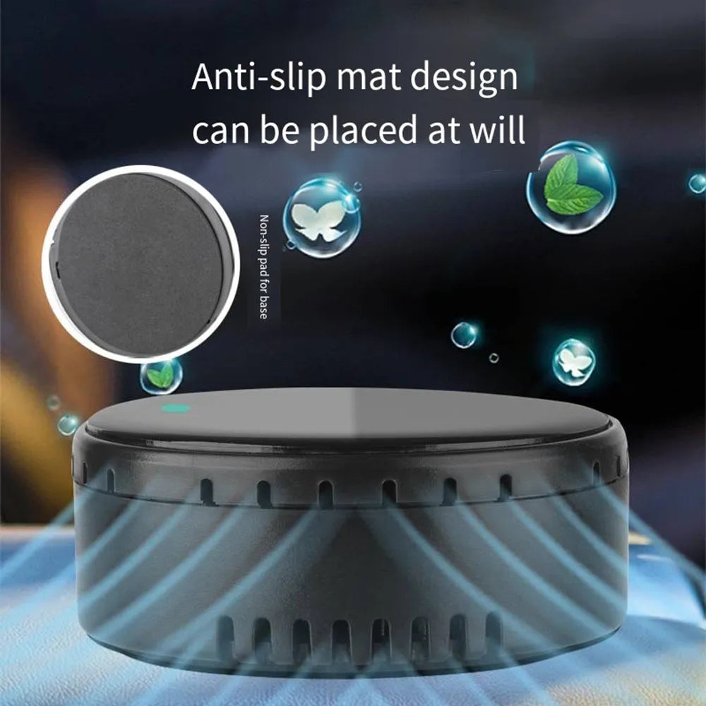 Black solar-powered car air humidifier mounted on vehicle air conditioning outlet