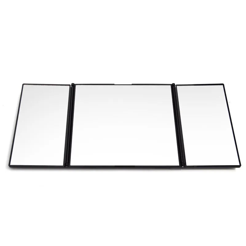 Silver car folding makeup mirror shown closed at 15.5cm width and opened at 30.5cm width