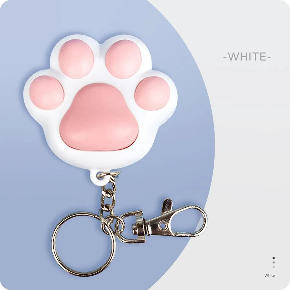 Pink and black rechargeable infrared cat teaser toy with keychain attachment showing 5cm dimensions