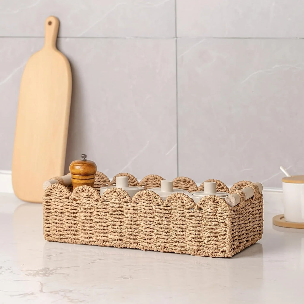 Modern woven paper storage basket in khaki colour on a wooden table, dimensions 35.5cm long by 16cm wide.