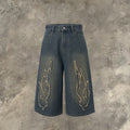 Men's black denim shorts with flame embroidery patches on leg, straight cut streetwear style