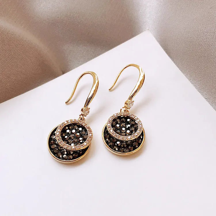 Black geometric alloy earrings with round piece design measuring 3.6cm in length