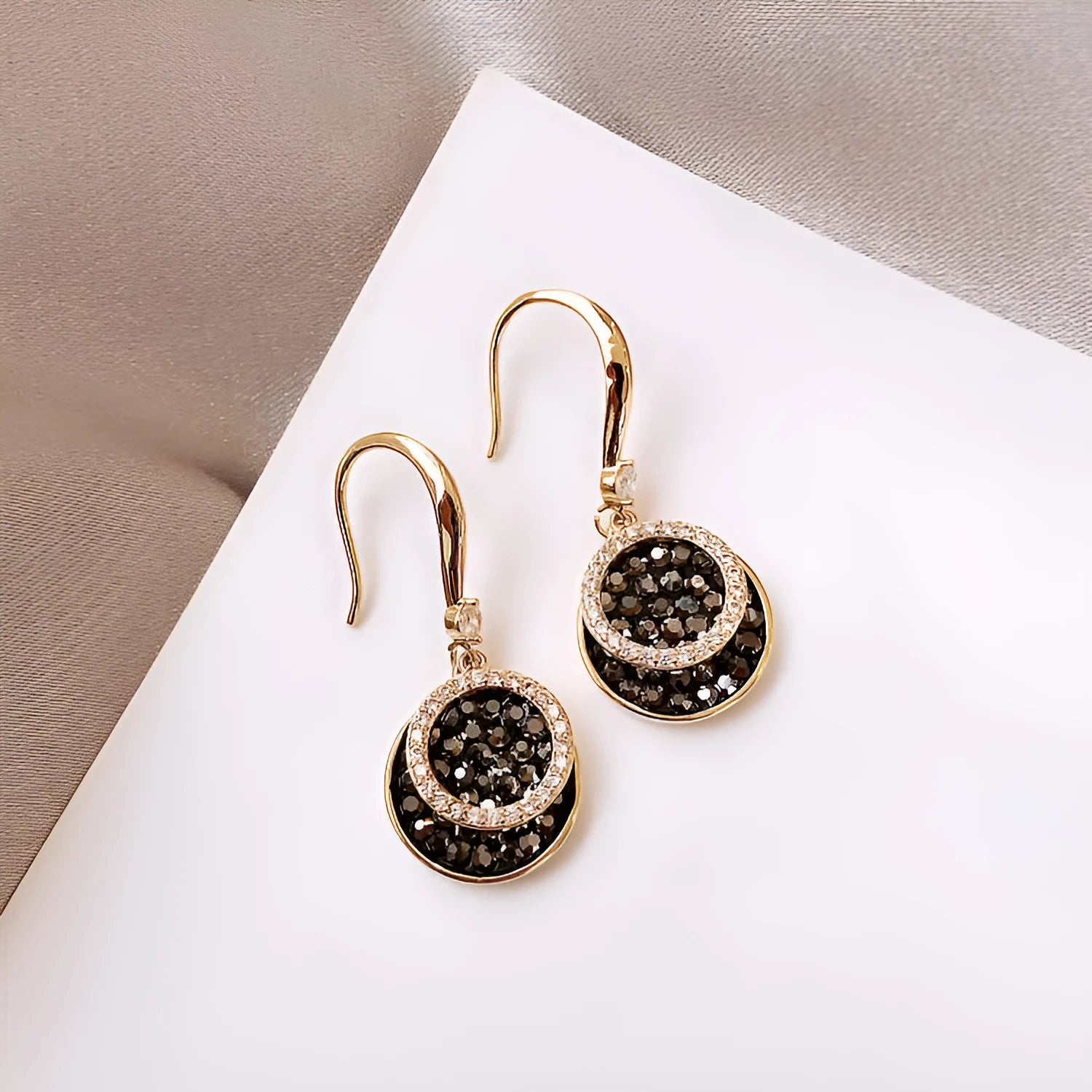 Black geometric alloy earrings with round piece design measuring 3.6cm in length