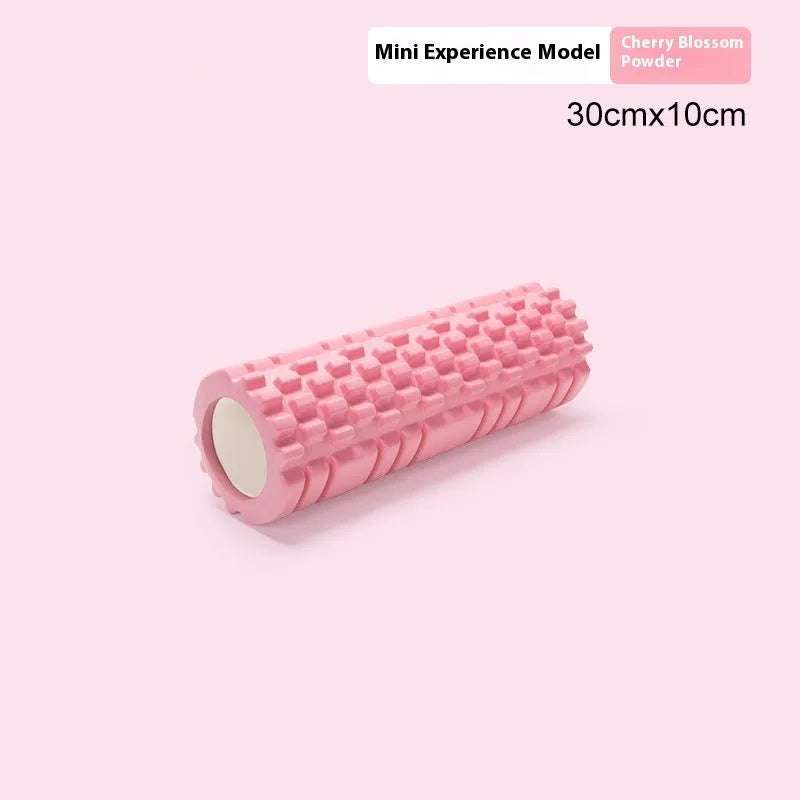 A black EVA foam roller for fitness and muscle recovery, shown next to a grey and pink version.