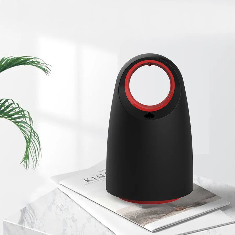Black or white plug-in silent mosquito killer with UV light on a table next to a USB cable