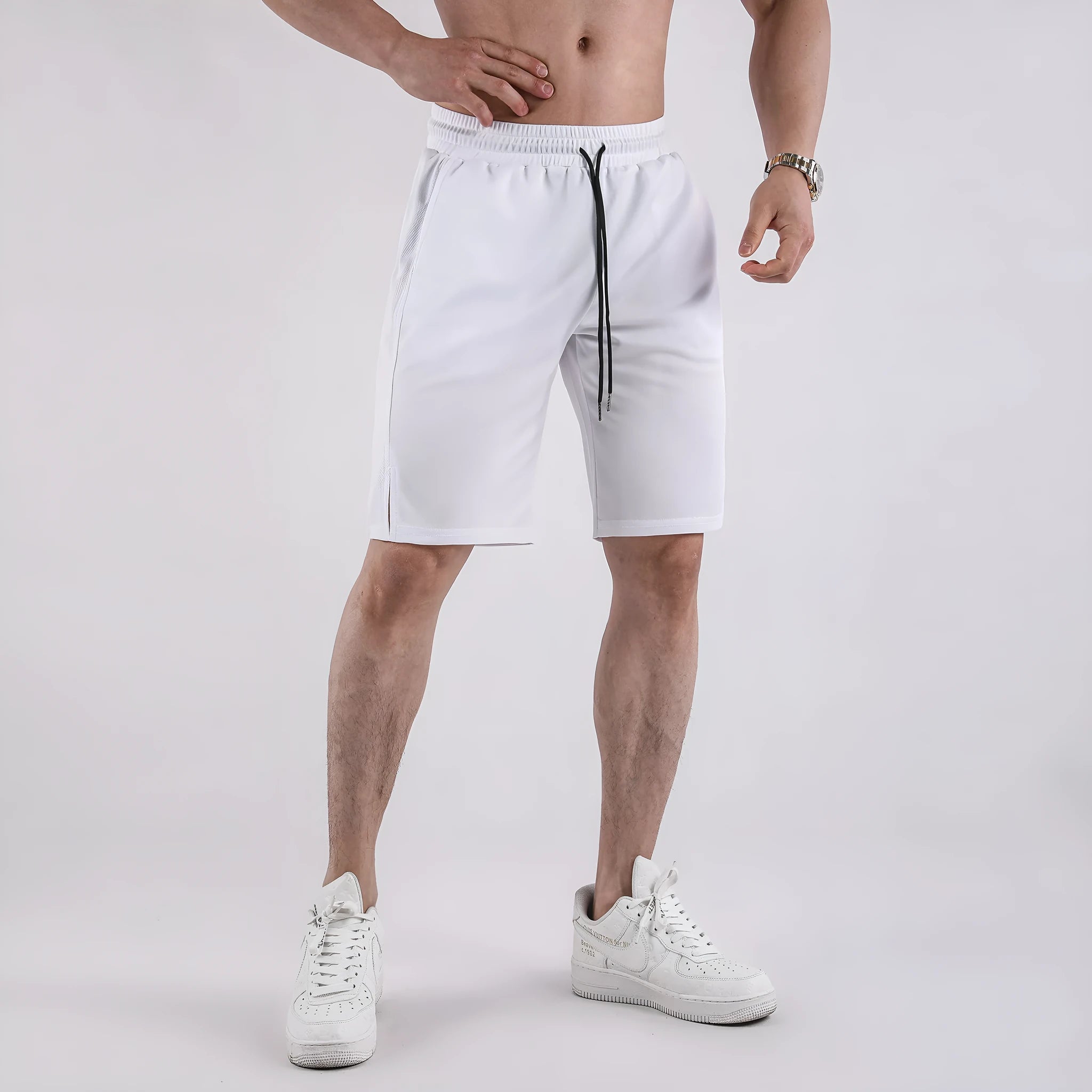 Men's white quick-drying mesh shorts with elastic waist and capri length for summer sports