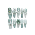 Armour nail art sticker in Camellia gradient colour with diamond, chain, bow, and butterfly pattern.