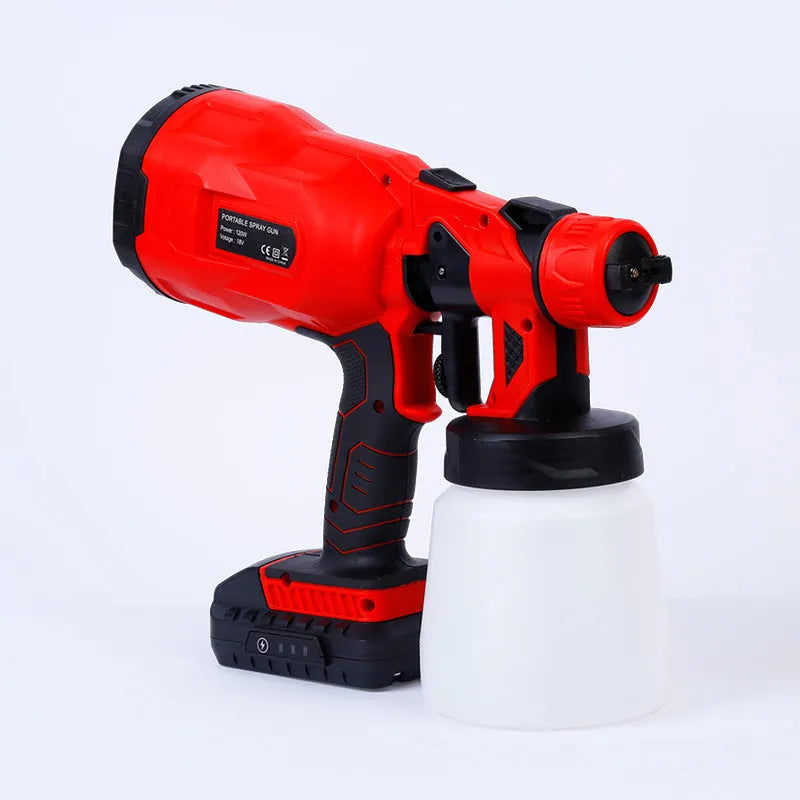 Blue cordless paint spray gun with 800ml cup and 1.8mm nozzle, showing trigger and battery compartment.