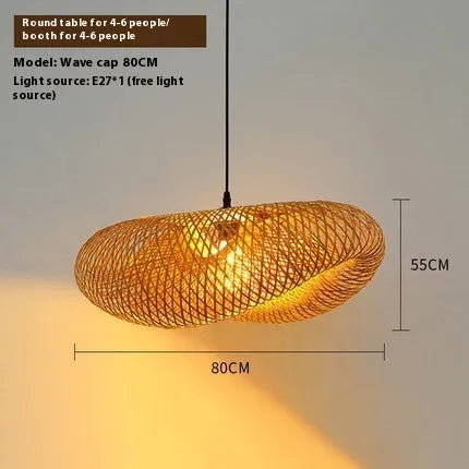 Woven bamboo straw hat-shaped hanging chandelier lamp showing natural texture and light diffusion.