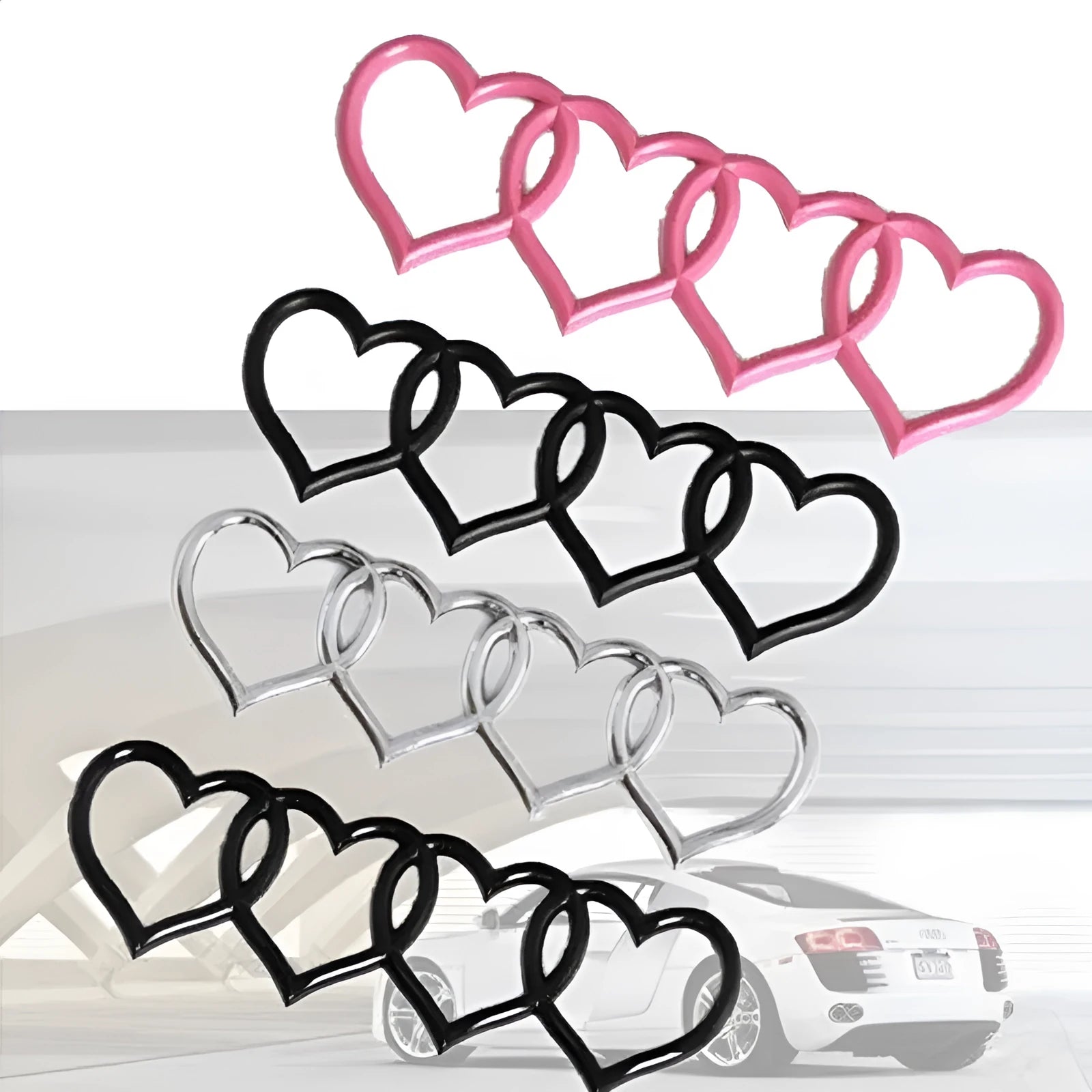 Heart-shaped body sticker with four-ring tail design in electroplated silver colour on a car bumper