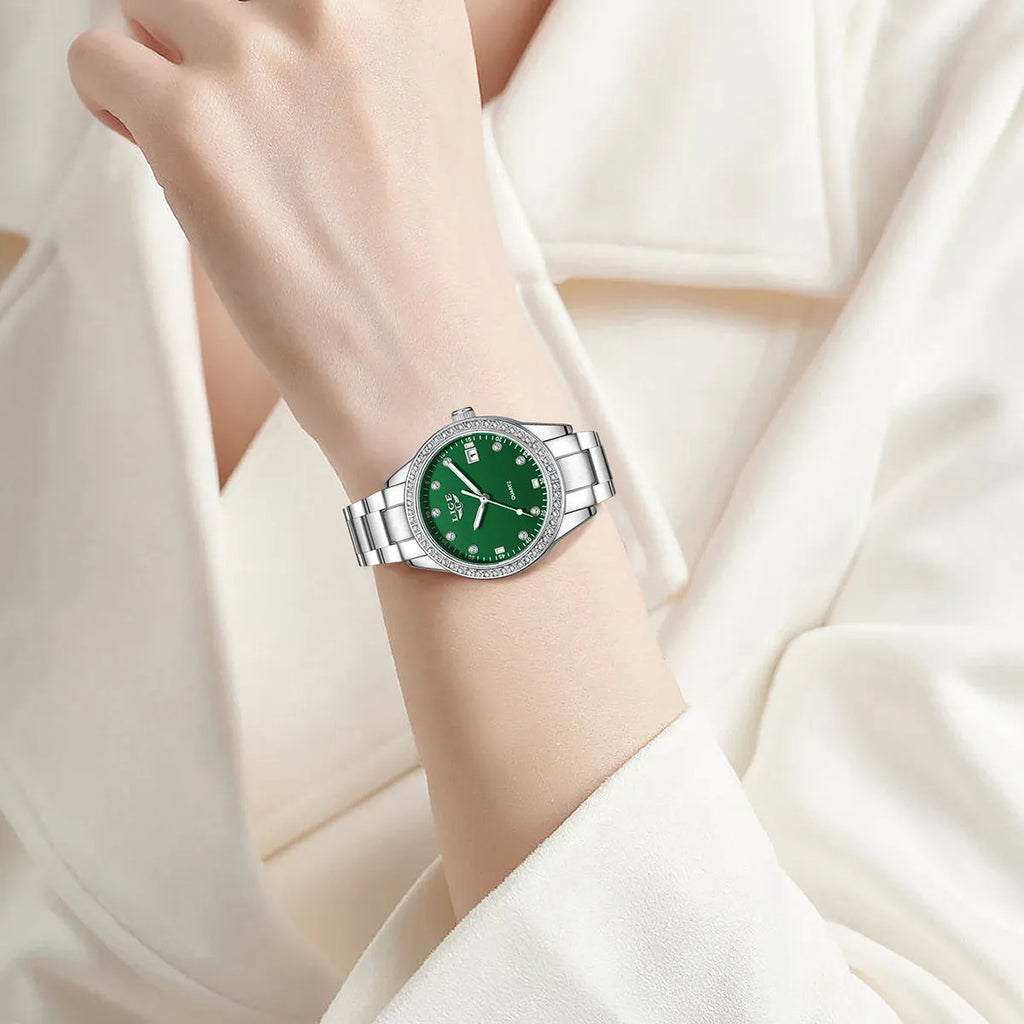 Silver fashion quartz watch with diamond-encrusted dial, stainless steel case, and luminous hands