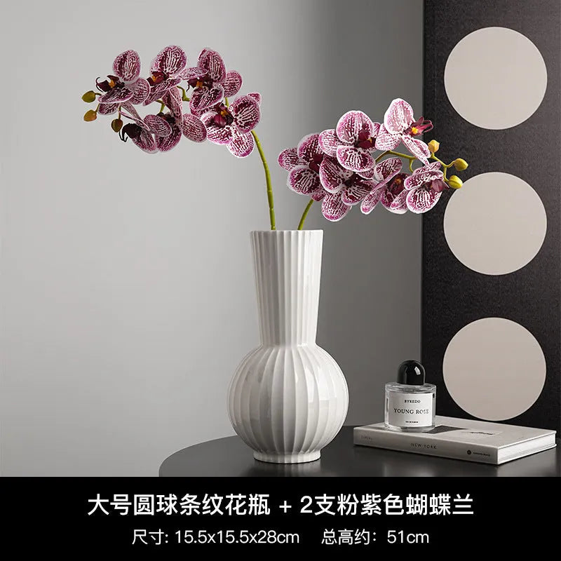 White American country style ball striped ceramic vase with orchid arrangement