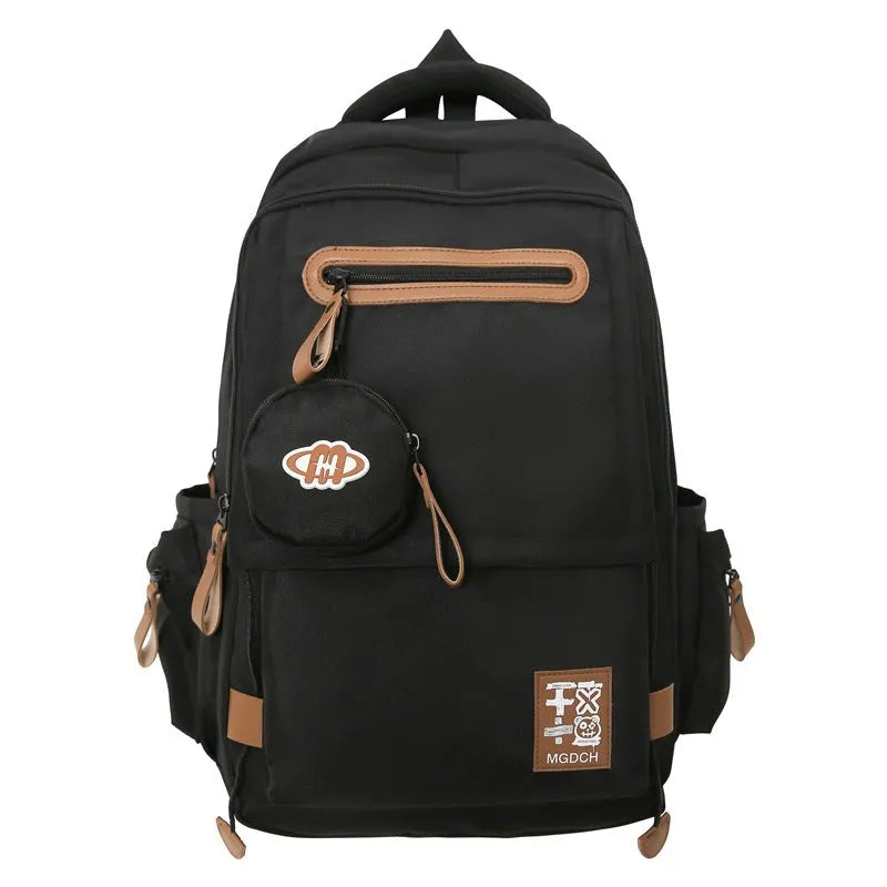 Large nylon school backpack in blue with curved shoulder straps and street style sewing detail