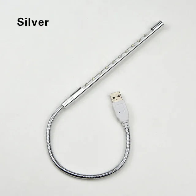 Spiral-shaped aluminium USB desk lamp in metallic colour, showing its 420mm height and push-button switch.