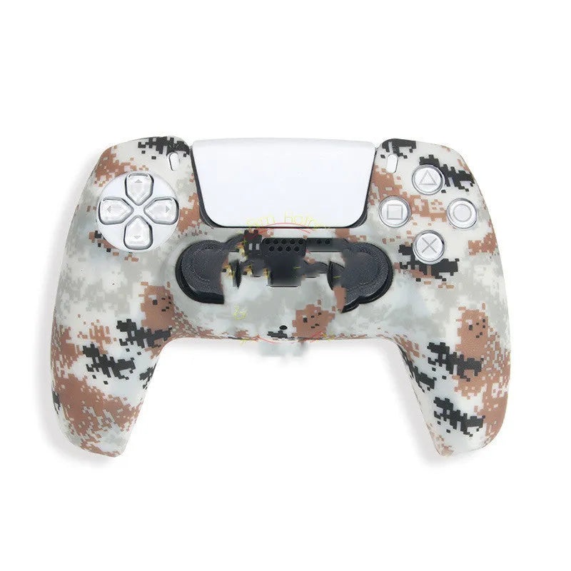 Camouflage silicone case fitted on a PS5 controller handle showing textured surface and snug fit