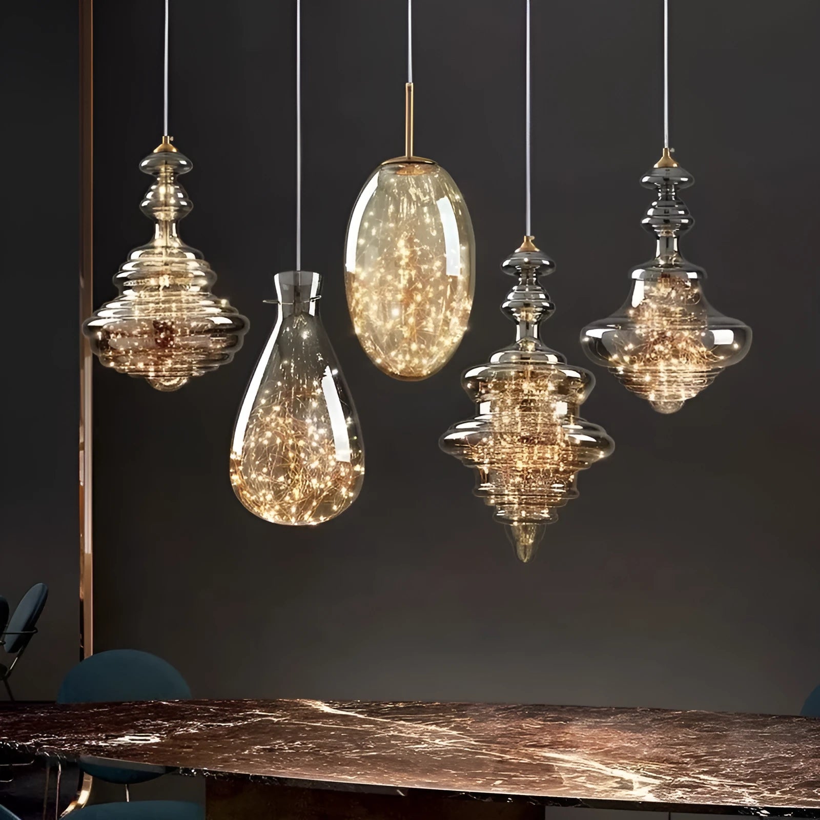Modern glass droplight chandelier with adjustable suspension showing clean contemporary design