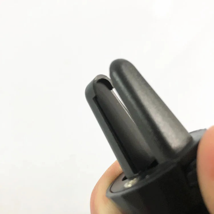 Glory black car phone holder mounted on vehicle air vent holding smartphone
