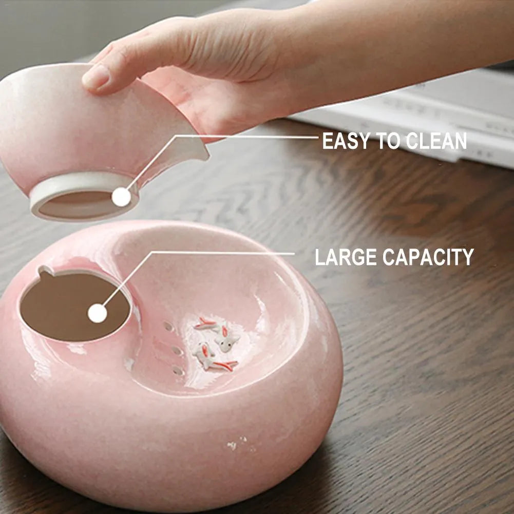 White ceramic automatic cat water dispenser with leaf-shaped bowl and pump