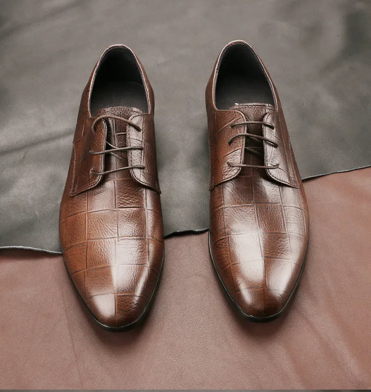 Men's black leather Derby shoes with checkered pattern detailing and pointed toe caps