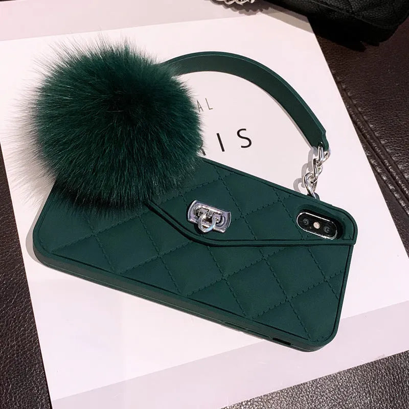 TPU iPhone mobile case with plush hairball grid texture in dark green, shown on a phone.
