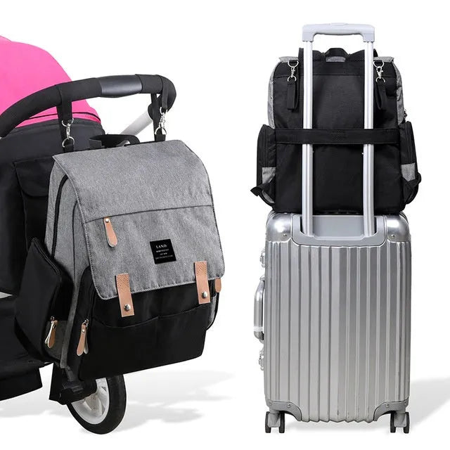 LAND Mommy large oxford cloth diaper backpack with changing mat, shown in grey colour.