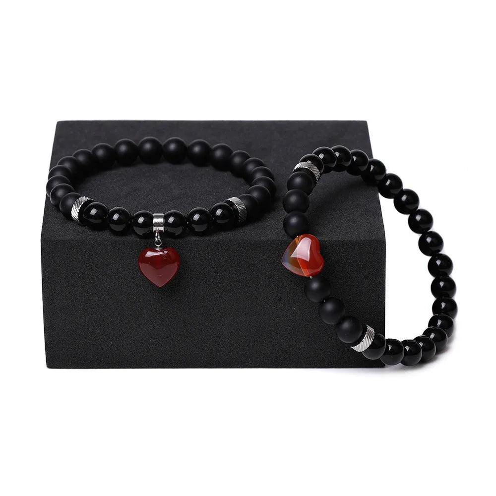 Two polished natural stone heart bracelets for couples in a choice of eight colours