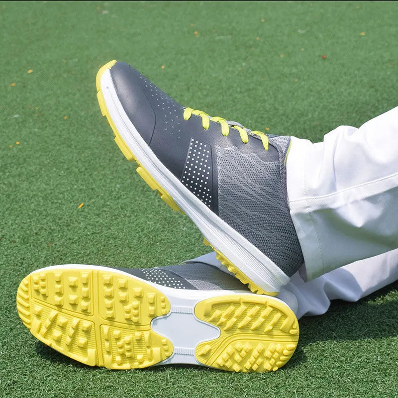 Men's waterproof non-slip golf training shoes in black with breathable mesh upper and rubber sole