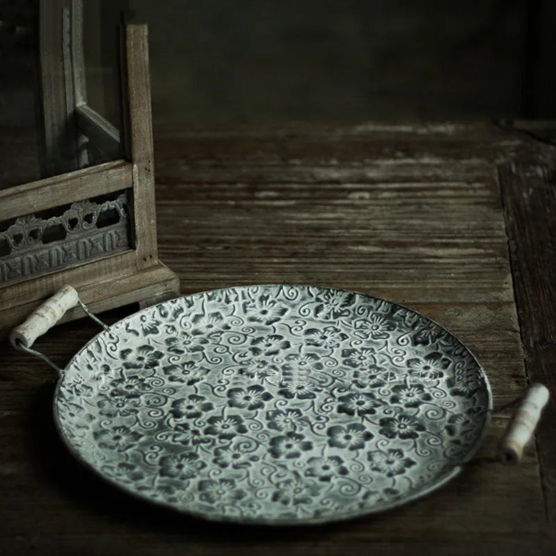 Round European-style wrought iron belt storage tray in two size options.