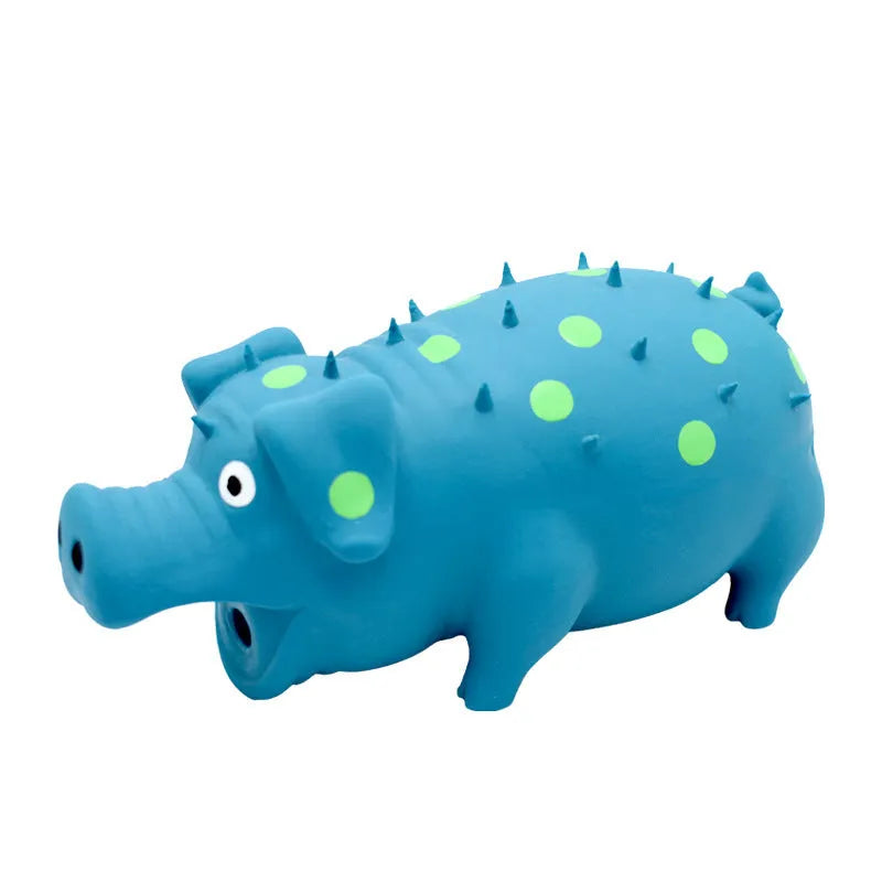 Blue pig-shaped latex dog chew toy with squeaker for aggressive chewers and teeth cleaning