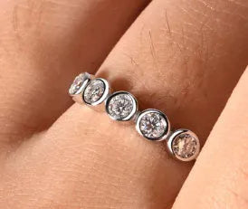 925 silver round moissanite ring with white gold electroplated finish on a geometric band, available in sizes 5 to 9