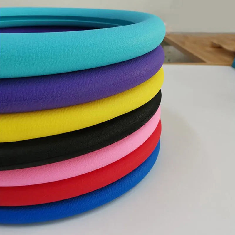 Anti-slip silicone steering wheel cover with round leather pattern in black for small cars, 32-40cm diameter
