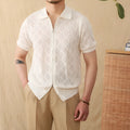 Light brown men's cotton cardigan with zipper front and lapel collar on a hanger.