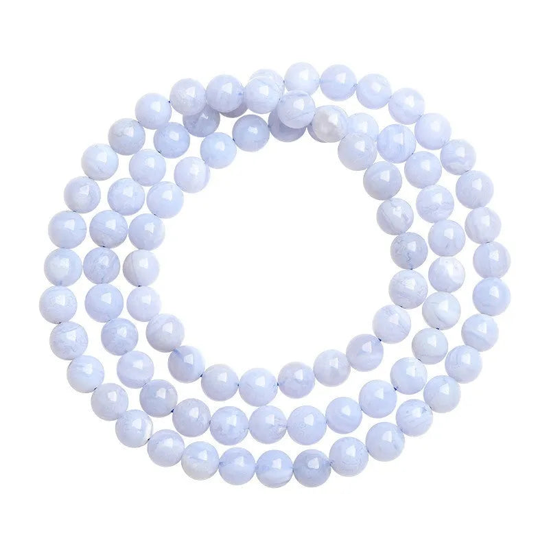 Blue agate bracelet with striped patterns showing 6-6.8mm beads and natural stone colour variations