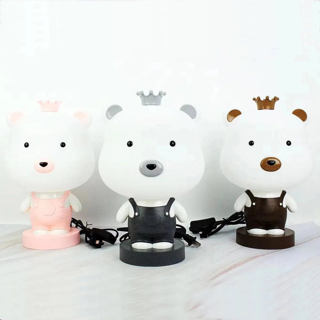 Cartoon animal table lamp with LED lighting and plastic shade in random bear, cattle, rabbit, or tiger designs