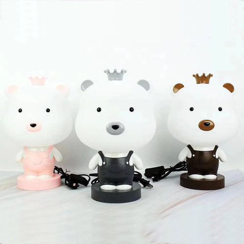 Cartoon animal table lamp with LED lighting and plastic shade in random bear, cattle, rabbit, or tiger designs