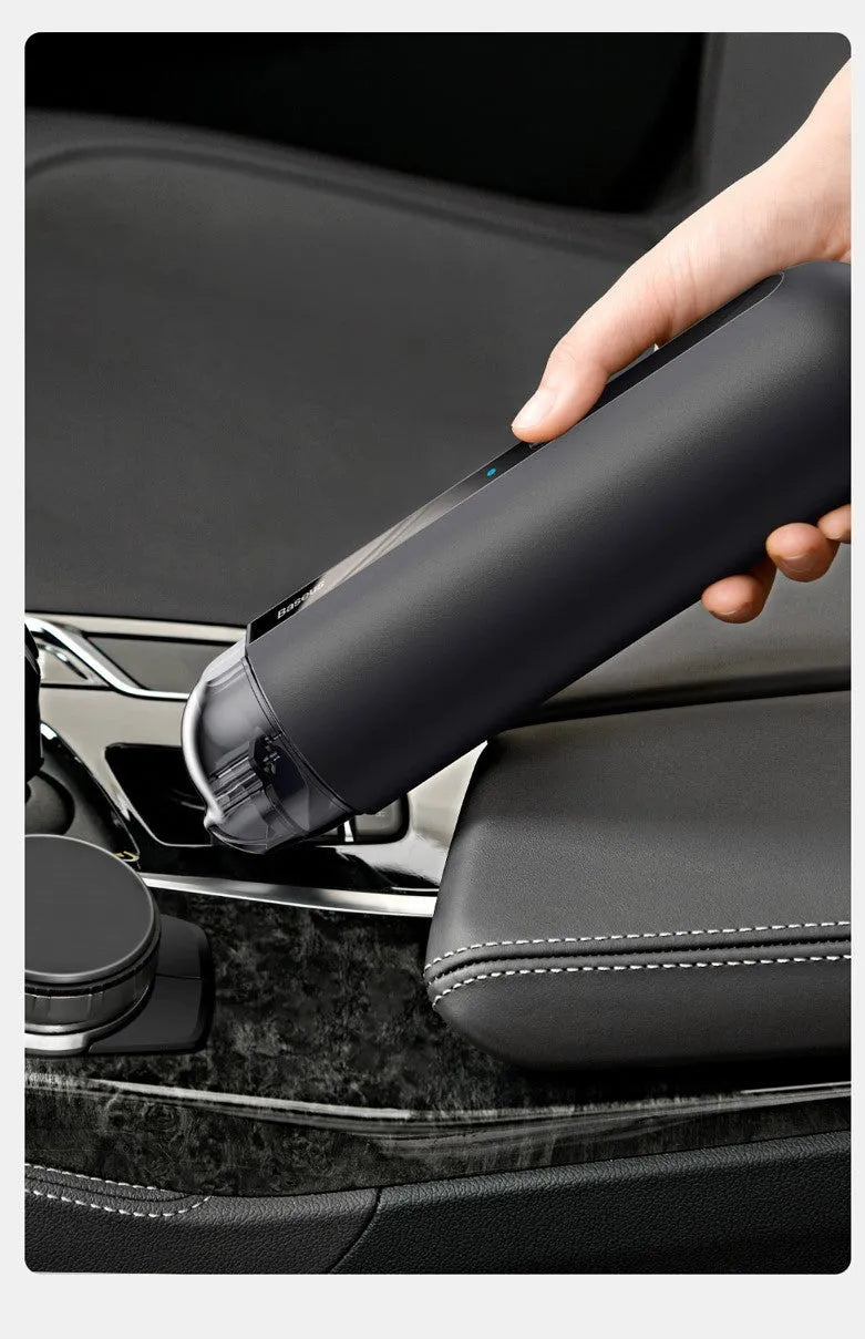 Starry Sky Black wireless handheld car vacuum cleaner with blowing hose on a car seat