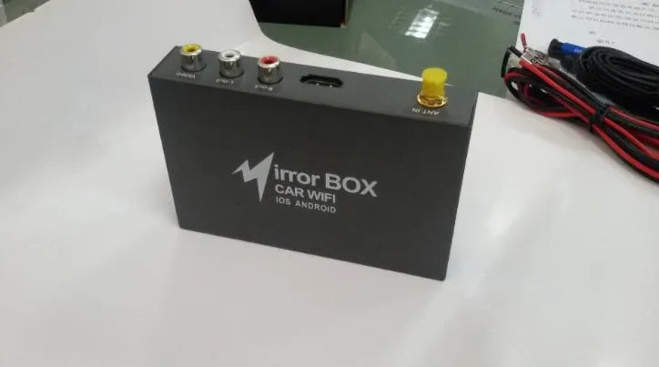 Black Car Mirror Link Box Wi-Fi converter with power cable, AV cable, antenna, and user manual.