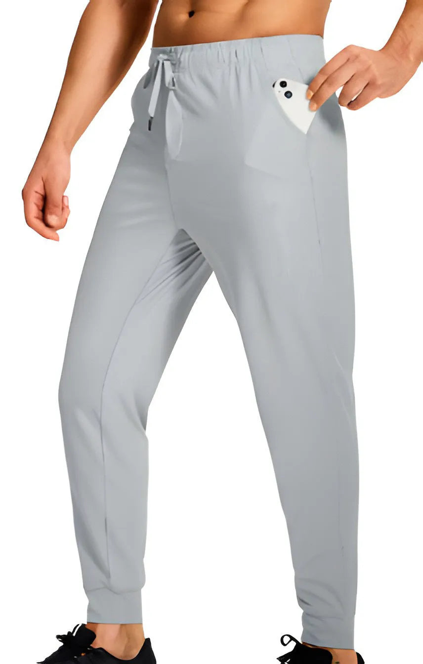 Men's loose casual polyester trousers in solid colour with size range label