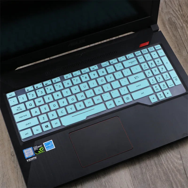 ASUS Flight laptop keyboard protective film cover shown in multiple colour options.