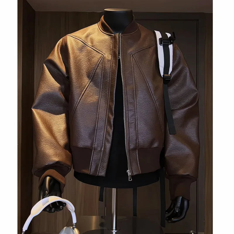 Men's black PU leather jacket with litchi pattern texture and extended length, shown in slim-fit light business style