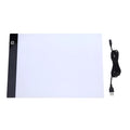 LED artist tracing table with A4 acrylic screen, USB dimming, and touch switch on a desk
